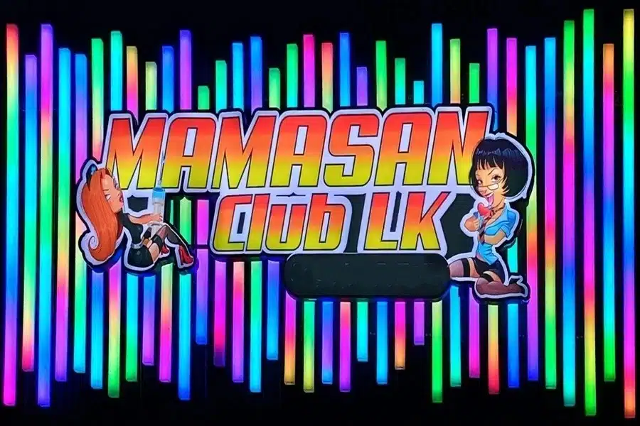 Logo of the Mamasan Club LK Pattaya with illuminated lettering against colorful background